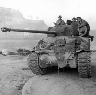 British Sherman Tank, the Firefly at the Battle of the Bulge, World War II. Photo by U.S. ARMY CENTER OF MILITARY HISTORY